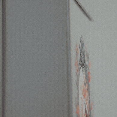 GIF animé montrant le mécanisme d'ouverture du coffret : le panneau avant s'abaisse pour déployer le diorama en pop-up, révélant la scène illustrée.