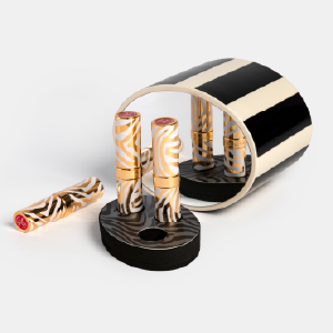 Lipstick display with integrated mirror, illustrating Anaïk's expertise in luxury cosmetics packaging design.
